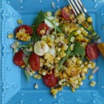 Grilled corn salad with tomatoes and basil